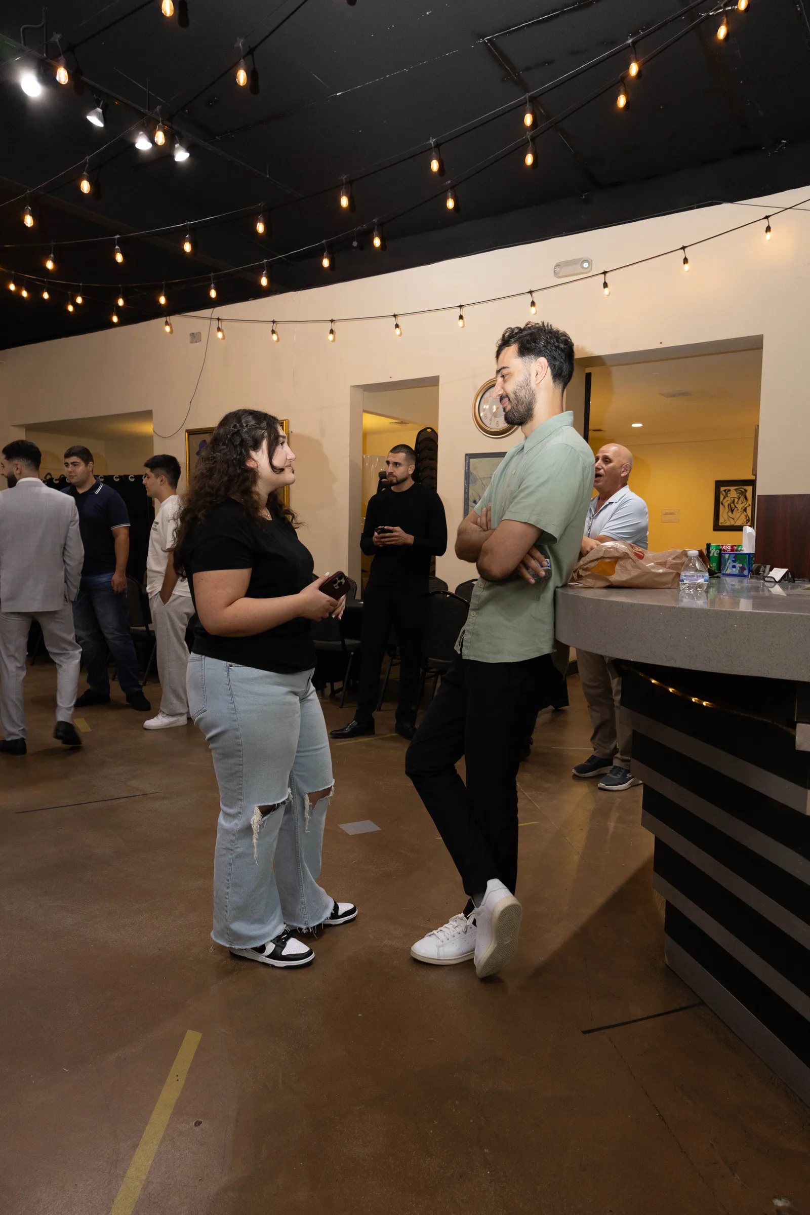 Two attendees talking during Armenian Innovators in AI.