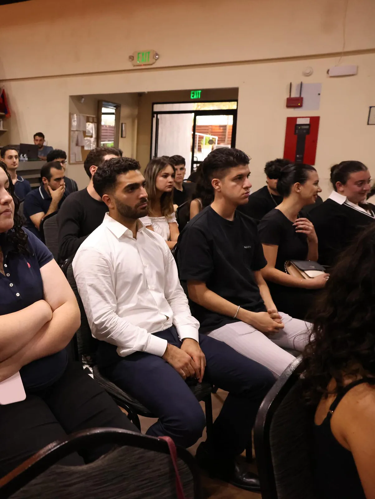 Attendees listening from the front rows during NAYI's first event.