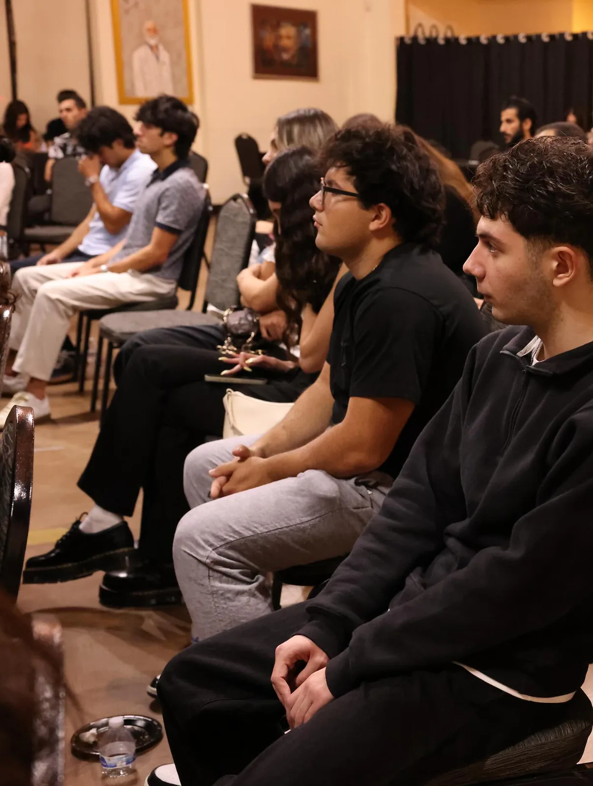 Attendees seated along the side of the room at NAYI's debut event.