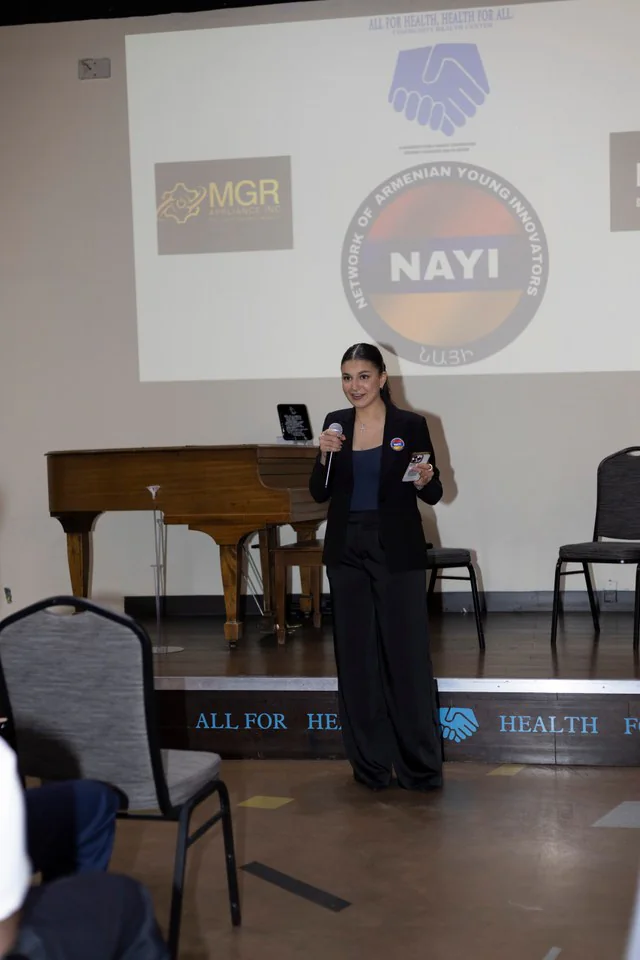 A KaraContent speaker presenting to NAYI attendees.