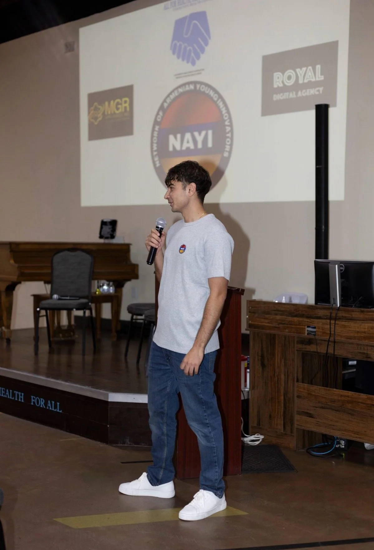 NAYI founder Alexander Kasumyan speaking at an event.